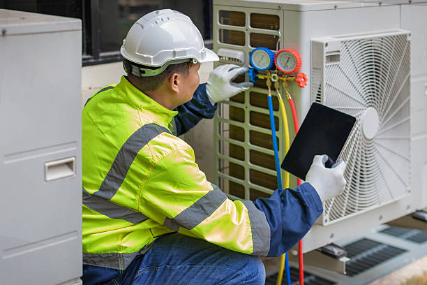 Professional Hvac technician working in Louisa, VA